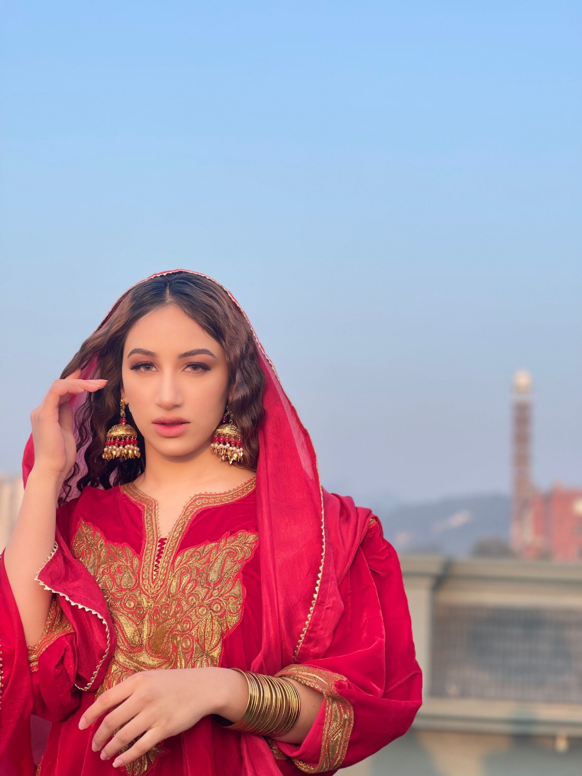 Aroob Khan in Maroon Tilla Embroidered Qurab Sleeved Pheran Salwar